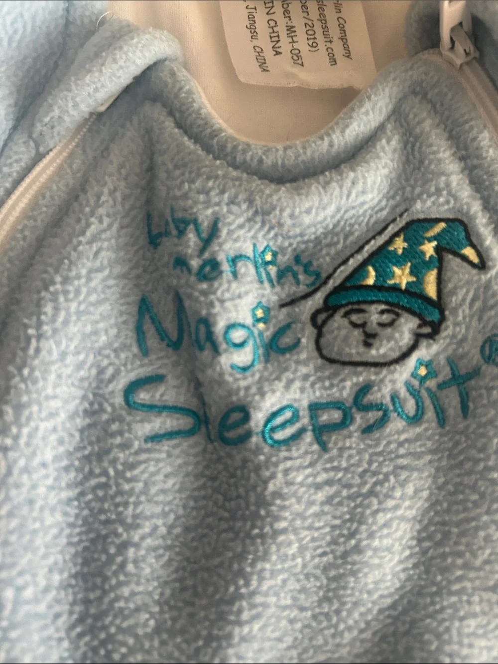 Baby Merlin size 3-6months small 12-18lbs.  Baby Merlin’s magic sleepsuit blue